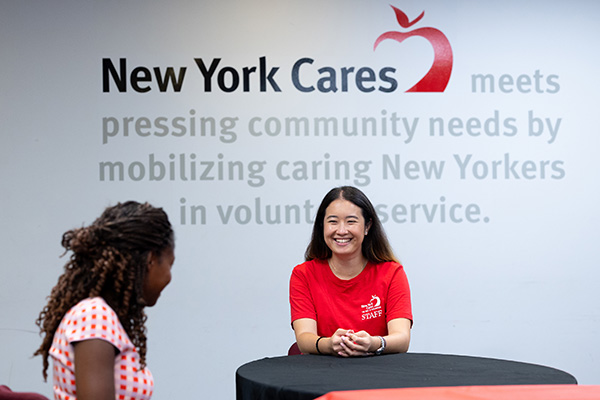 Social worker smiles at elderly woman