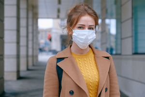 Social work professional wearing a mask